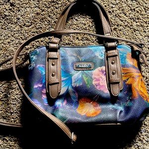 Small-medium purse with beautiful floral design. Dual straps for carrying choice